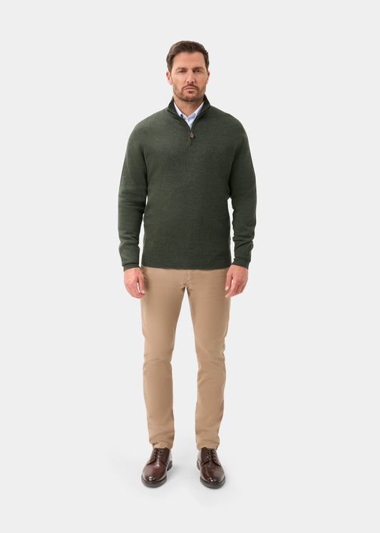Man in Hanbury Pure Cashmere Quarter Zip Jumper in Rosemary, khaki pants, and brown shoes, facing forward.