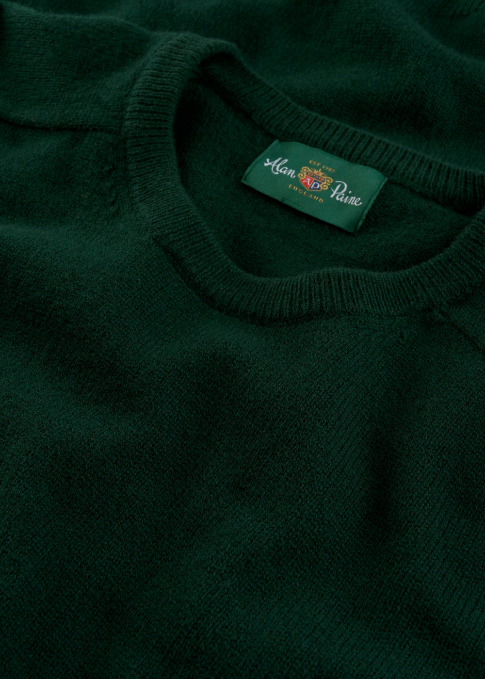 Dorset Lambswool Crew Neck Jumper in Tartan Green, classic fit, with Alan Paine label visible on the collar.