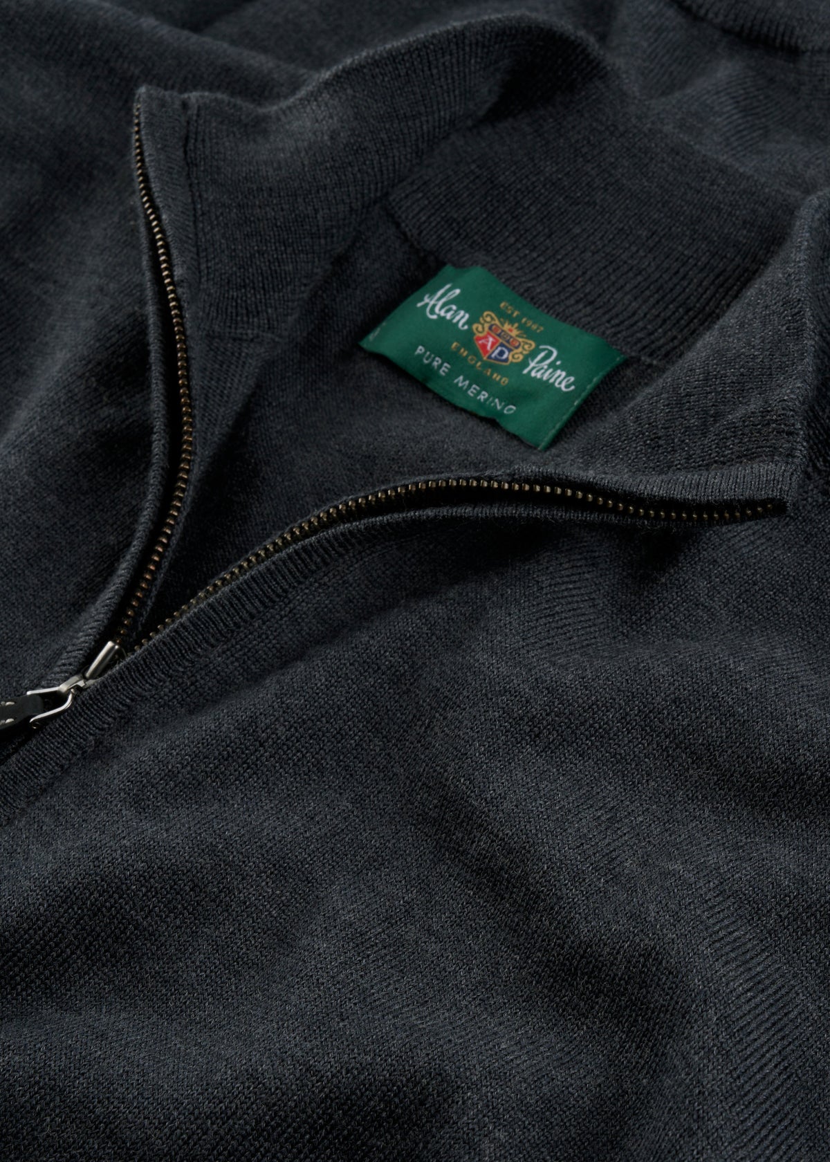 Barton Merino Wool Quarter Zip Jumper in charcoal, regular fit, with a visible Pure Merino label on green fabric.