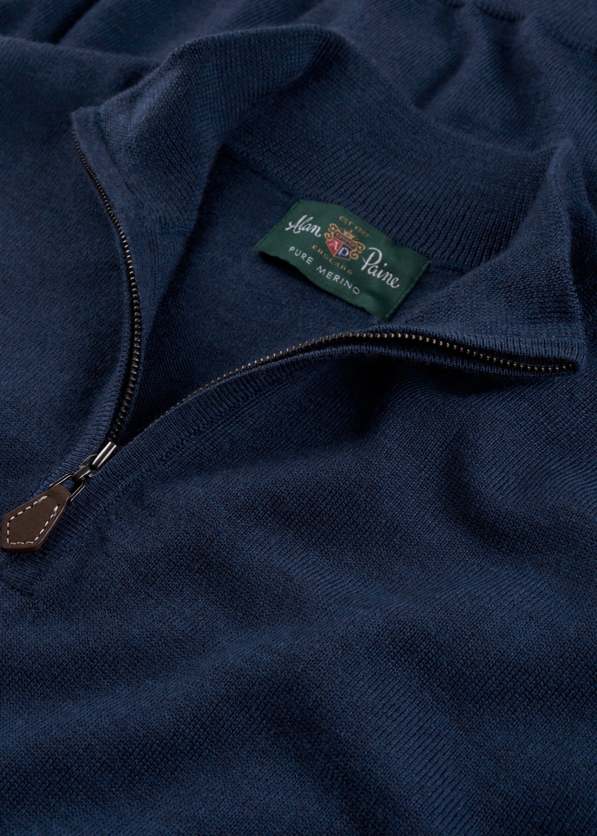 Barton Merino Wool Quarter Zip Jumper in indigo with leather zipper pull and green Alan Paine label, regular fit.