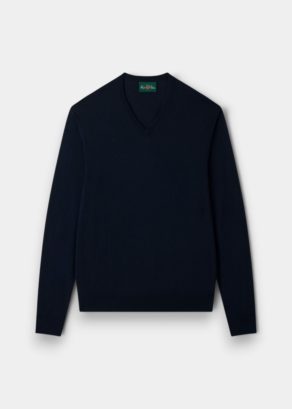 A dark navy blue V-neck sweater with long sleeves, laid flat against a light gray background.