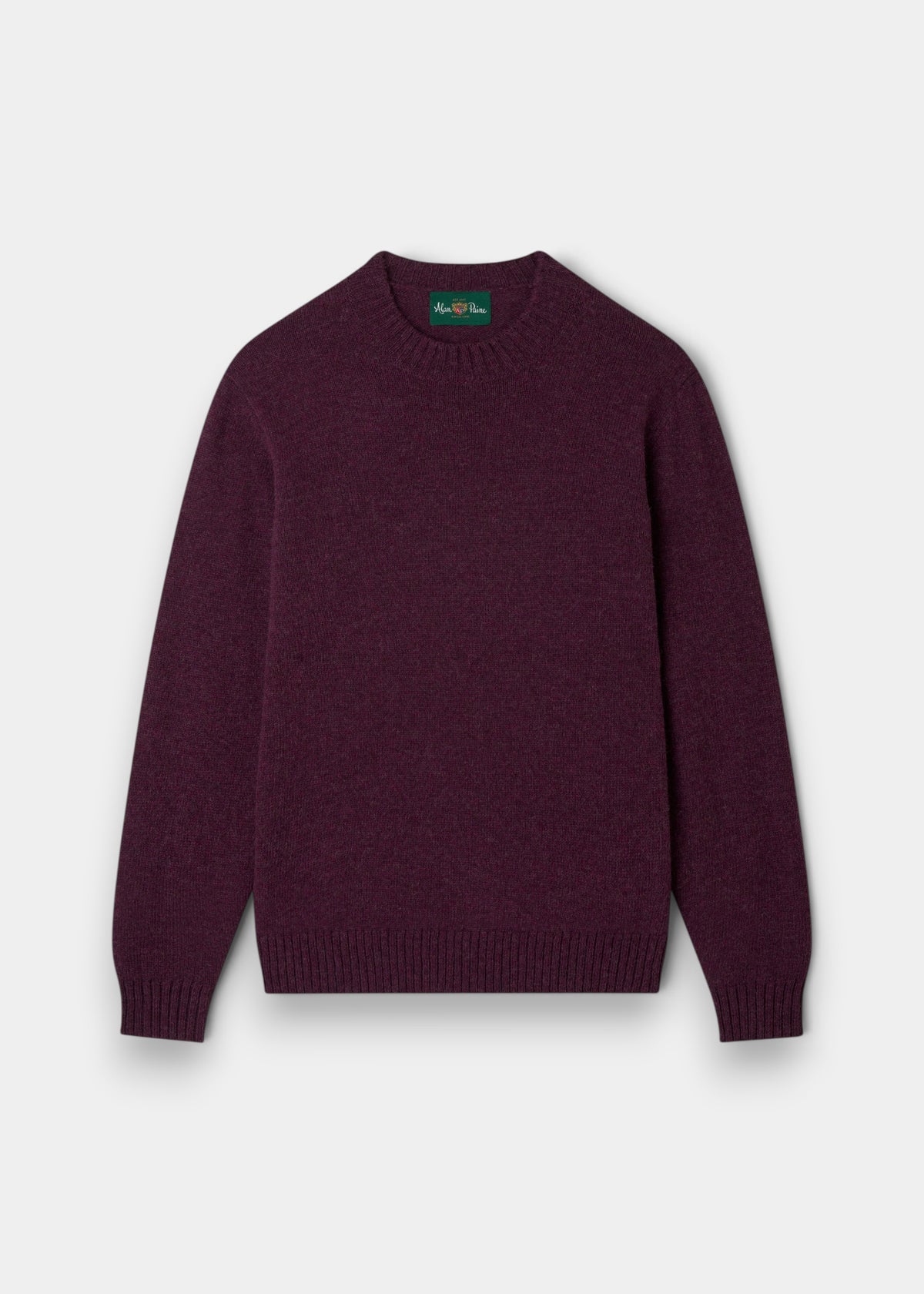 The Kinnadie Supersoft Shetland Wool Crew Neck Jumper in Elderberry is laid flat on a white background.