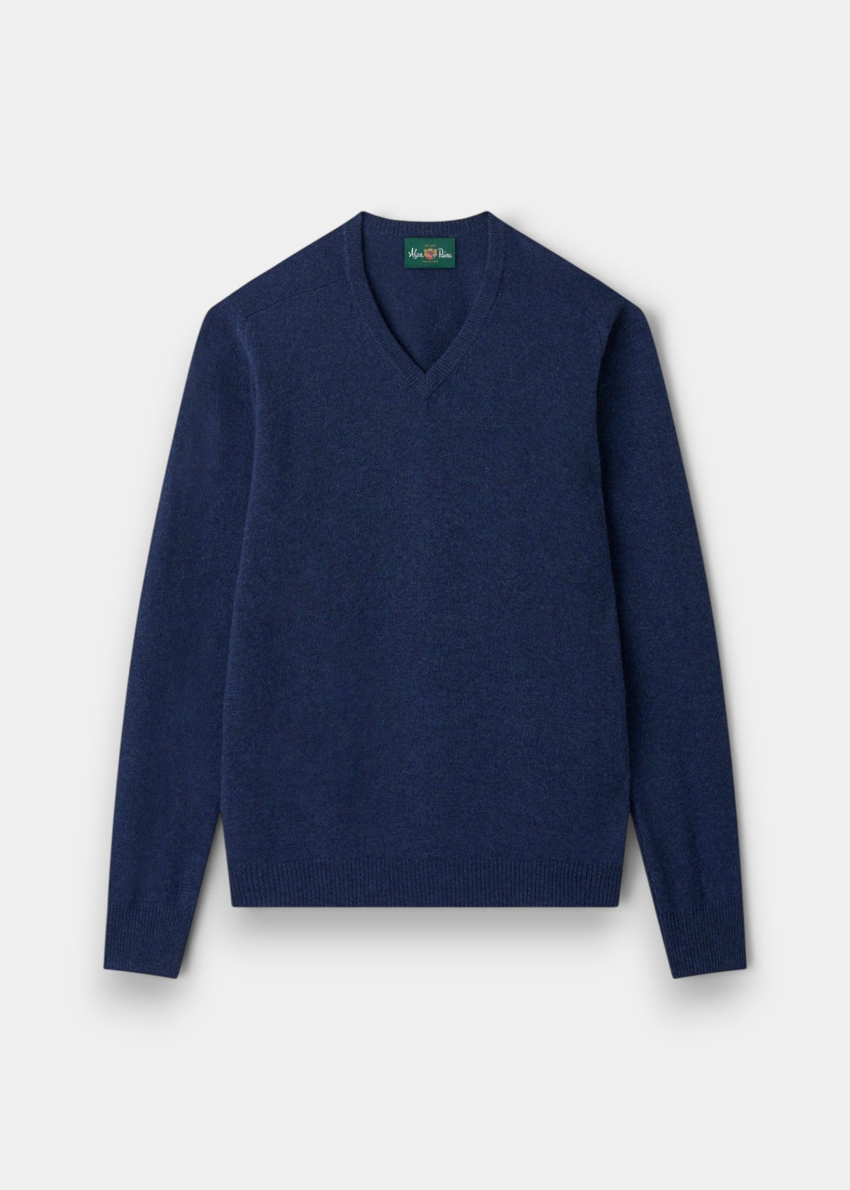 Alan Paine Hampshire lambswool V-neck jumper in rhapsody blue with saddle shoulder and ribbed cuffs.