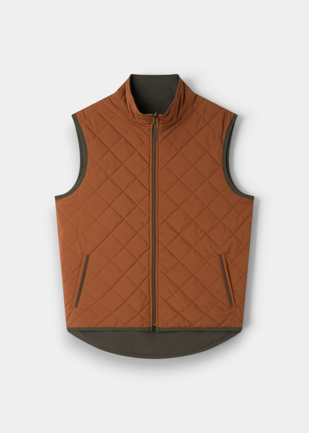Swifthall Reversible City Gilet In Olive and Cider, a water-resistant, reversible gilet in rust orange with olive green trim.