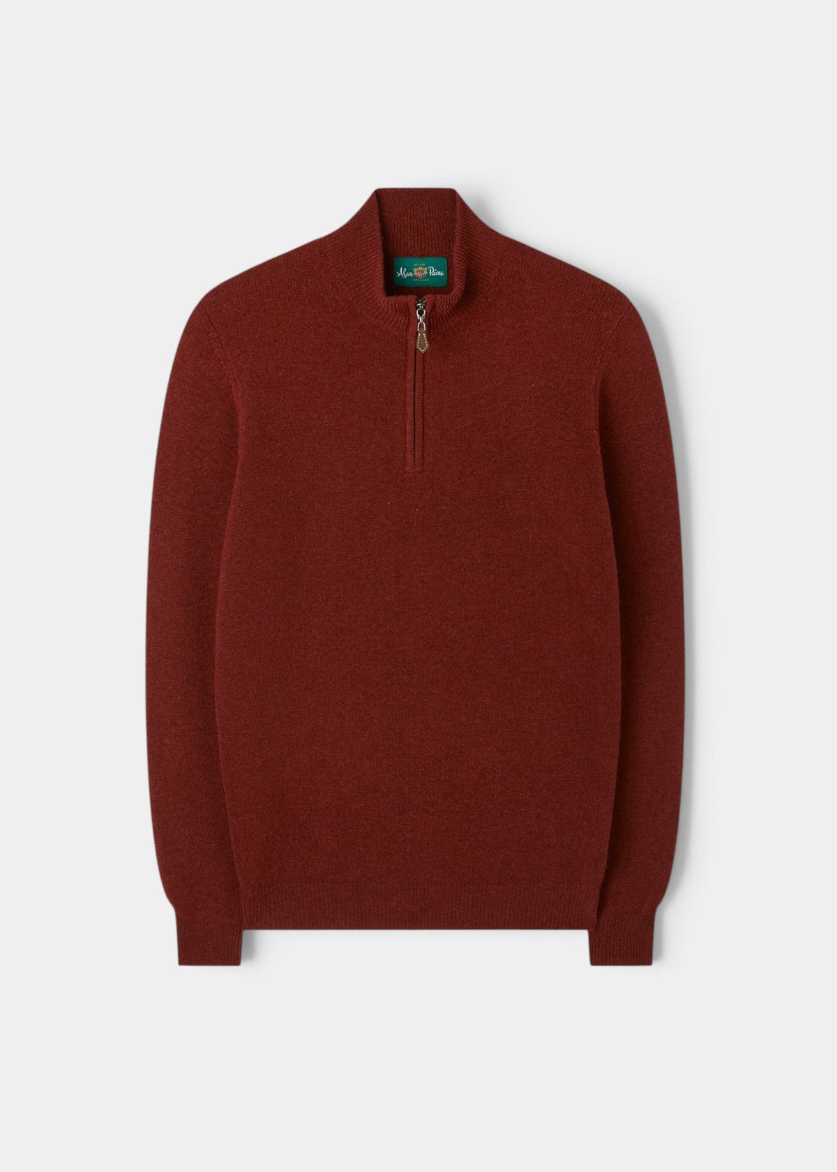 Sutherland Lambswool Quarter Zip Jumper In Sienna, a rust-colored quarter-zip sweater with a high neck and ribbed cuffs.
