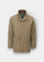 Axford Men’s Aspen Waterproof Field Coat—shooting fit, high collar, snap buttons, flap pockets, adjustable waist.