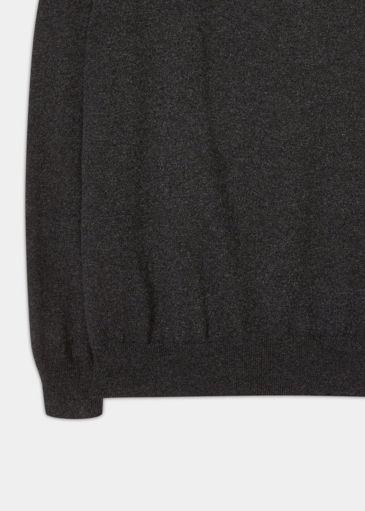 Close-up of Hanbury Pure Cashmere Quarter Zip Jumper in charcoal, featuring ribbed hem, cuffs, and mock neck.