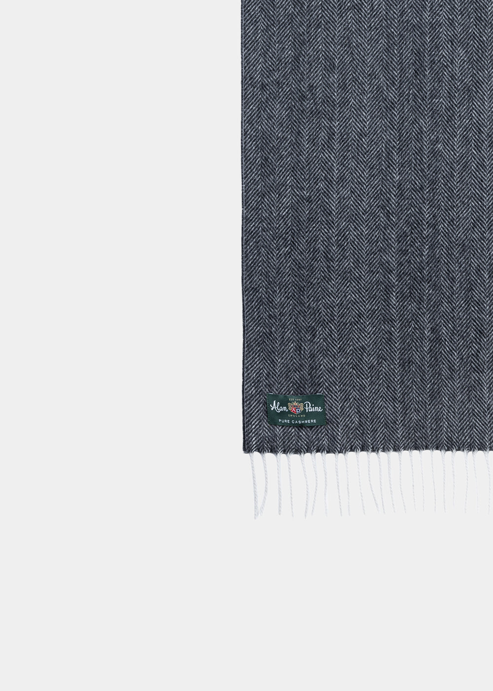 Kinross Cashmere Herringbone Scarf in charcoal, with fringed ends and a green label, shown on a white background.